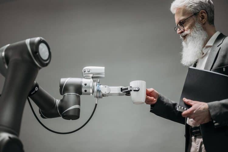 Photo by Pavel Danilyuk: https://www.pexels.com/photo/a-robot-holding-a-cup-8439093/