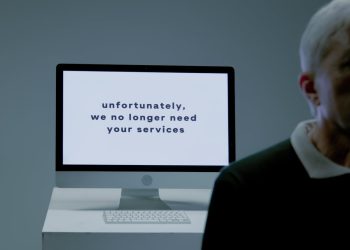 Photo by Ron Lach : https://www.pexels.com/photo/part-of-a-body-of-an-elderly-man-and-behind-screen-with-information-that-he-is-not-needed-anymore-9830817/