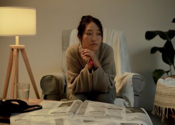 Photo by Ron Lach : https://www.pexels.com/photo/portrait-of-unemployed-woman-sitting-on-armchair-9832690/