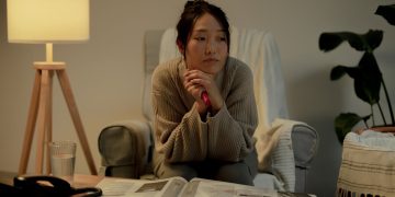 Photo by Ron Lach : https://www.pexels.com/photo/portrait-of-unemployed-woman-sitting-on-armchair-9832690/