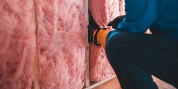 Photo by Erik Mclean: https://www.pexels.com/photo/unrecognizable-worker-insulating-with-stone-wool-6124239/