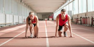 Photo by Andrea Piacquadio: https://www.pexels.com/photo/young-athletes-preparing-for-running-in-training-hall-3764014/
