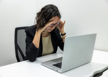Photo by Resume Genius: https://www.pexels.com/photo/tired-young-female-employee-feeling-stressed-headache-and-burnout-from-computer-work-18848928/