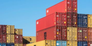 Photo by Jan van der Wolf from Pexels: https://www.pexels.com/photo/stack-of-colorful-shipping-containers-against-blue-sky-33537946/