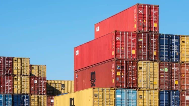 Photo by Jan van der Wolf from Pexels: https://www.pexels.com/photo/stack-of-colorful-shipping-containers-against-blue-sky-33537946/
