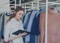 Photo by Vitaly Gariev: https://www.pexels.com/photo/woman-using-tablet-in-fashion-boutique-36730440/