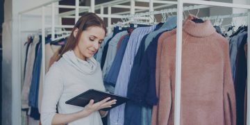 Photo by Vitaly Gariev: https://www.pexels.com/photo/woman-using-tablet-in-fashion-boutique-36730440/