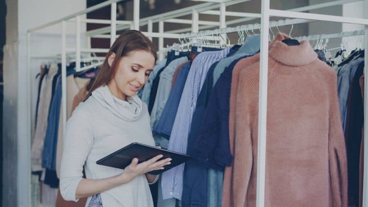 Photo by Vitaly Gariev: https://www.pexels.com/photo/woman-using-tablet-in-fashion-boutique-36730440/