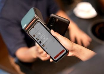 Photo by iMin Technology from Pexels: https://www.pexels.com/photo/a-person-holding-a-payment-terminal-12935076/