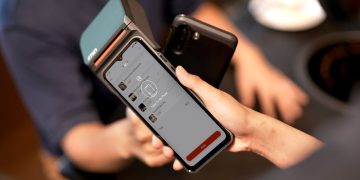 Photo by iMin Technology from Pexels: https://www.pexels.com/photo/a-person-holding-a-payment-terminal-12935076/