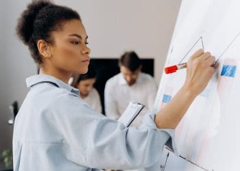 Photo by Mikhail Nilov from Pexels: https://www.pexels.com/photo/a-group-of-people-having-a-meeting-in-the-office-6592753/