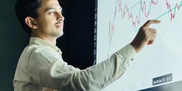 Photo by Kaushal Moradiya from Pexels: https://www.pexels.com/photo/young-professional-analyzing-stock-market-data-32228271/