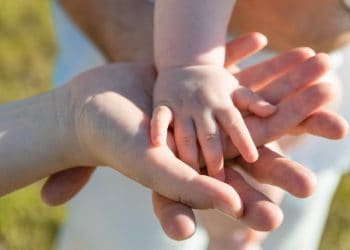Photo by Samuel Dostál from Pexels: https://www.pexels.com/photo/close-up-photo-of-baby-s-hand-on-parent-s-hands-6540658/