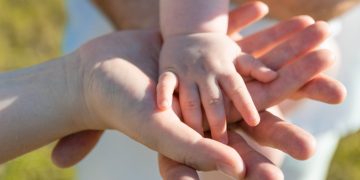 Photo by Samuel Dostál from Pexels: https://www.pexels.com/photo/close-up-photo-of-baby-s-hand-on-parent-s-hands-6540658/
