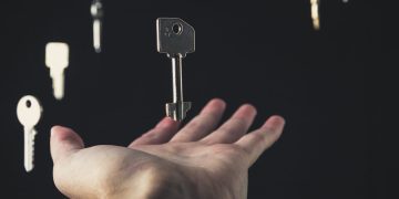 Photo by Bastian Riccardi from Pexels: https://www.pexels.com/photo/floating-keys-above-open-hand-on-black-background-29222872/