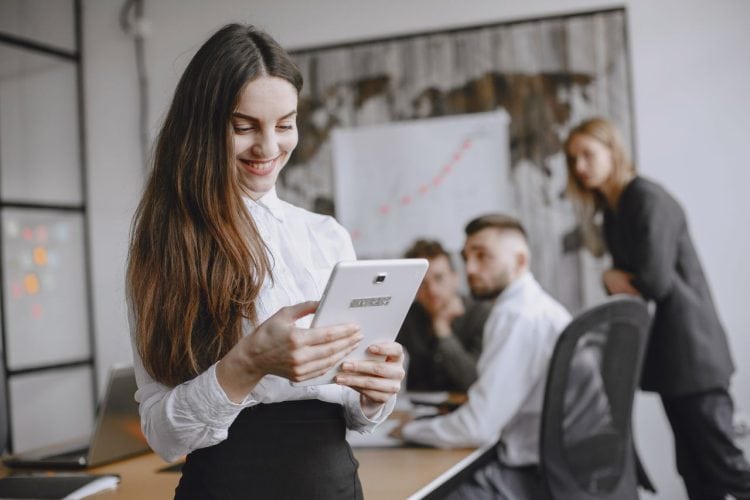 Photo by Gustavo Fring from Pexels: https://www.pexels.com/photo/woman-in-white-long-sleeve-top-holding-a-tablet-4872048/