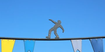 Photo by Michaela St from Pexels: https://www.pexels.com/photo/figurine-of-acrobat-on-line-20764199/
