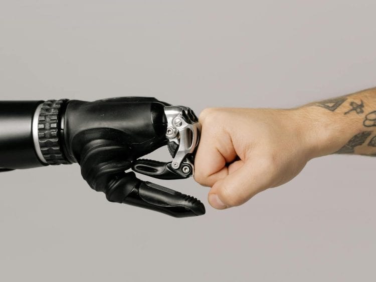 Photo by cottonbro studio from Pexels: https://www.pexels.com/photo/close-up-shot-of-fist-bump-6153344/